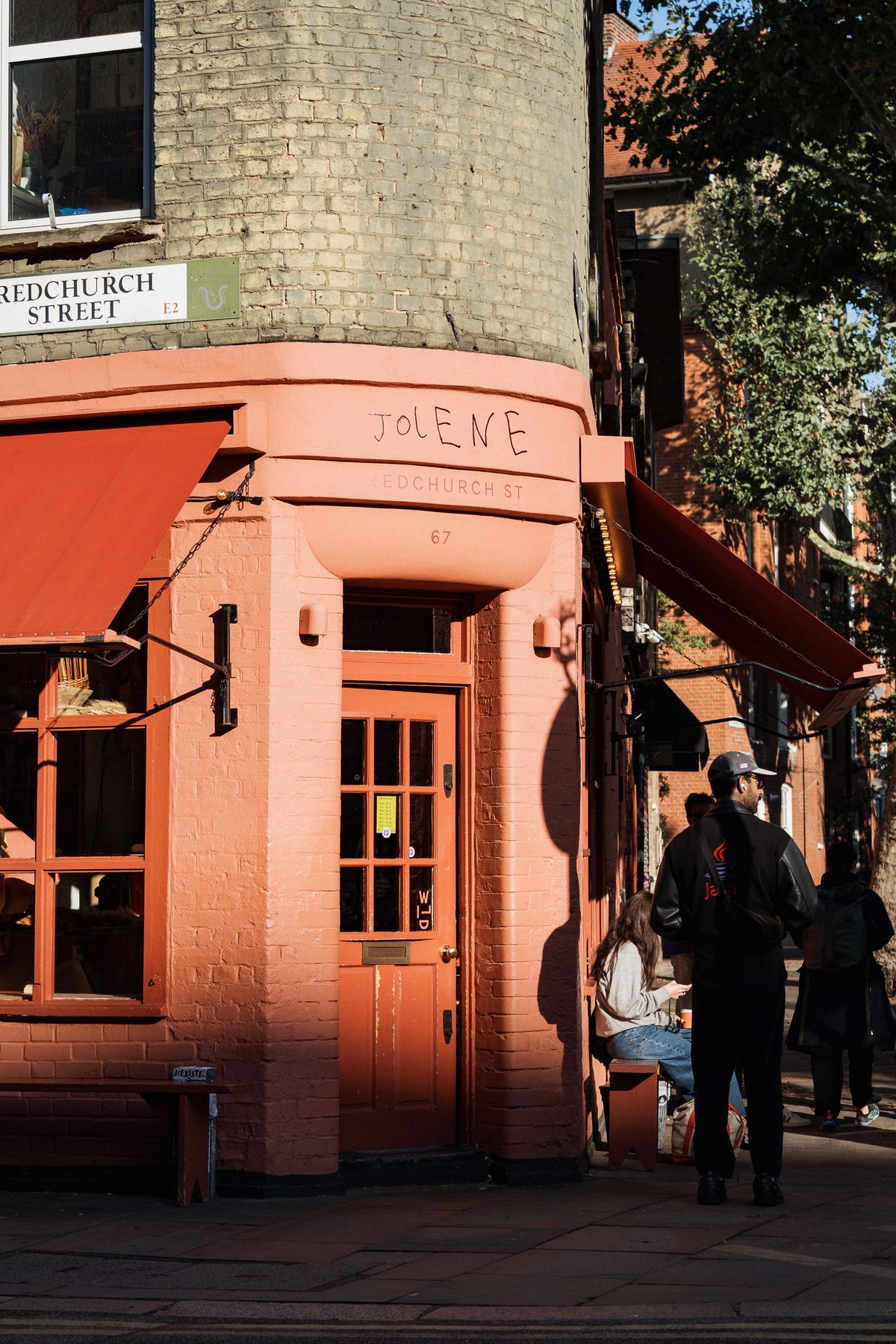 A polished large-format shopfront fascia on a corner building